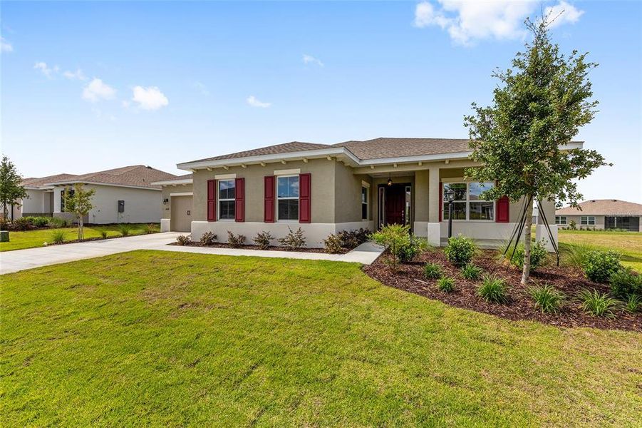 Front exterior of a new home in , Ocala, FL, highlighting curb appeal (Image 20).