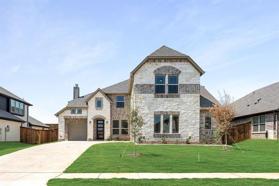 Front exterior of a new home in Mockingbird Hills 60-65, Joshua, TX, highlighting curb appeal (Image 2).