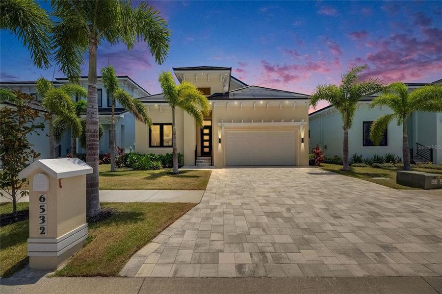 Front exterior of a new home in , Apollo Beach, FL, highlighting curb appeal (Image 23).