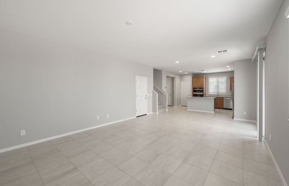Spacious, unfurnished interior of a new home in Asante- Atrium Series, Surprise (Image 13).