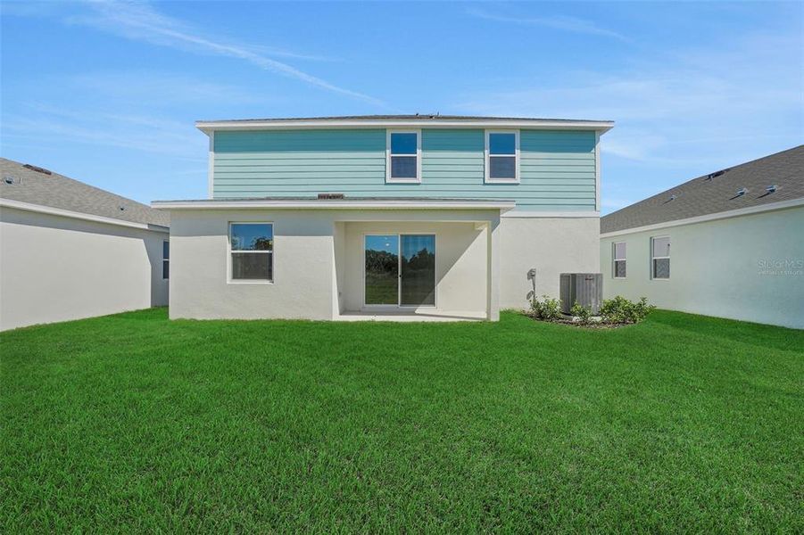 Exterior details and patio area of a home in Willowbrook North, Winter Haven (Image 22).