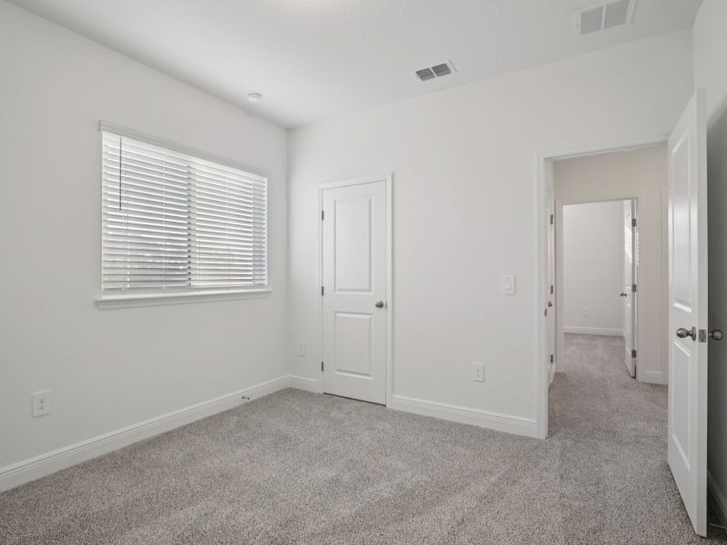 Spacious, unfurnished interior of a new home in Cyrene at Minneola - Villas, Minneola (Image 11). Spacious, unfurnished interior of a new home in Cyrene at Minneola - Villas, Minneola (Image 11).