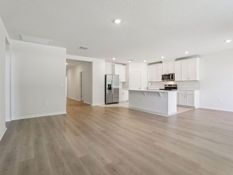 Spacious, unfurnished interior of a new home in Springs at Lake Alfred - Signature Series, Lake Alfred (Image 8). Spacious, unfurnished interior of a new home in Springs at Lake Alfred - Signature Series, Lake Alfred (Image 8).