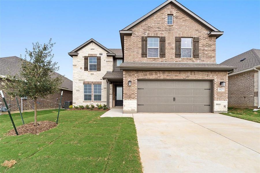 Front exterior of a new home in Liberty Pointe, Gainesville, TX, highlighting curb appeal (Image 2). Front exterior of a new home in Liberty Pointe, Gainesville, TX, highlighting curb appeal (Image 2).