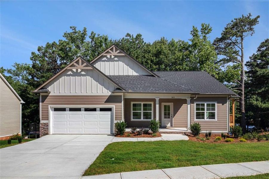 Front exterior of a new home in , Carrollton, GA, highlighting curb appeal (Image 22).
