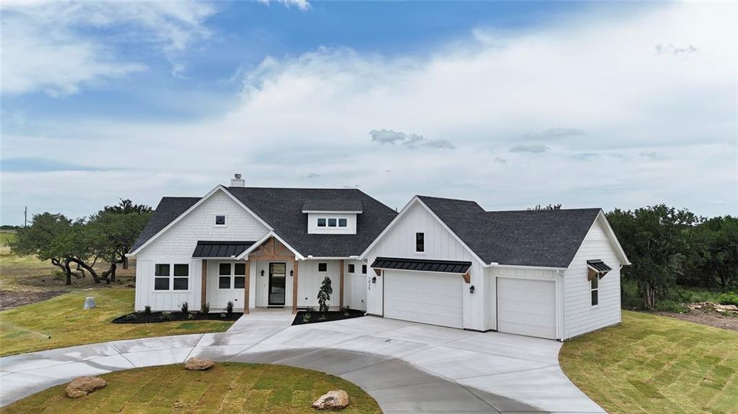 Front exterior of a new home in , Weatherford, TX, highlighting curb appeal (Image 24).