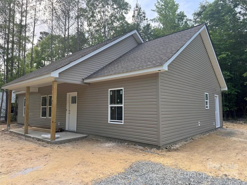 Front exterior of a new home in , Mount Gilead, NC, highlighting curb appeal (Image 1). Front exterior of a new home in , Mount Gilead, NC, highlighting curb appeal (Image 1).