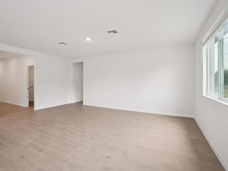 Spacious, unfurnished interior of a new home in The Grove at Stuart Crossing - Classic Series, Bartow (Image 10). Spacious, unfurnished interior of a new home in The Grove at Stuart Crossing - Classic Series, Bartow (Image 10).