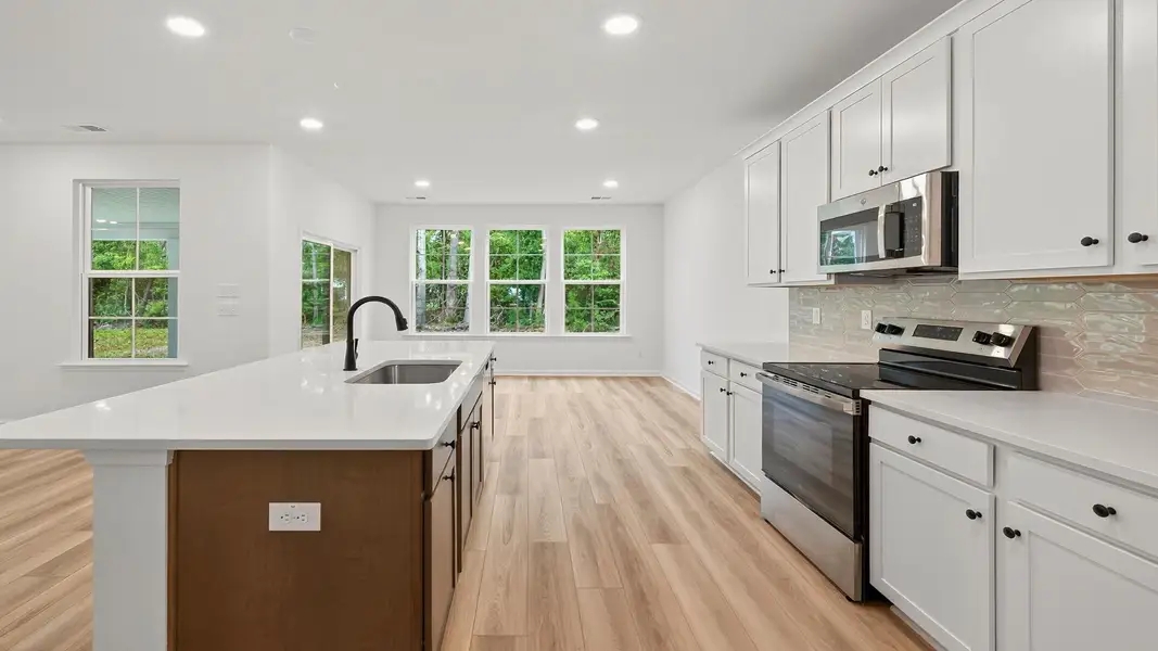 Furnished interior view inside a new home in Creekside at Andrews, Summerville (Image 12). Furnished interior view inside a new home in Creekside at Andrews, Summerville (Image 12).