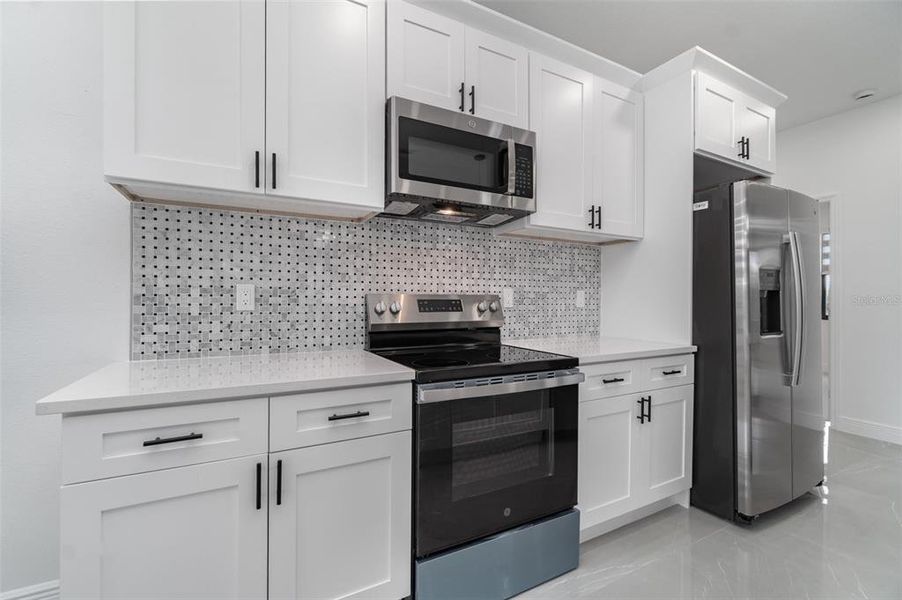 Furnished interior view inside a new home in , Port Charlotte (Image 10). Furnished interior view inside a new home in , Port Charlotte (Image 10).