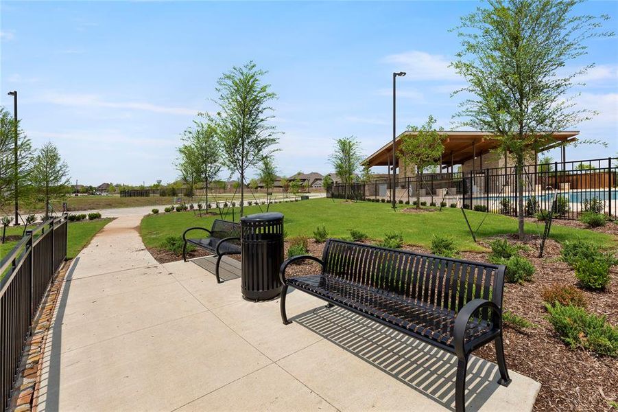 Front exterior of a new home in Edgewater, Fate, TX, highlighting curb appeal (Image 17).