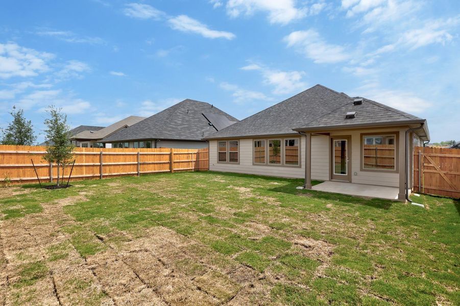 Exterior details and patio area of a home in Prairie Winds, Hutto (Image 18). Exterior details and patio area of a home in Prairie Winds, Hutto (Image 18).