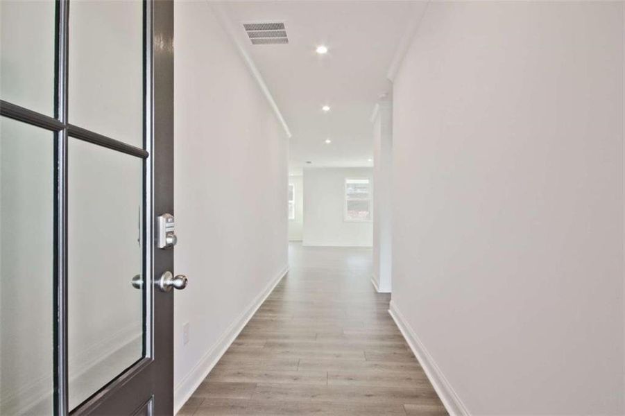 Spacious, unfurnished interior of a new home in The Paddocks at Doc Hughes, Buford (Image 17).