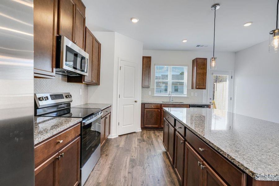 Furnished interior view inside a new home in Rosewood Farm, Lawrenceville (Image 11).