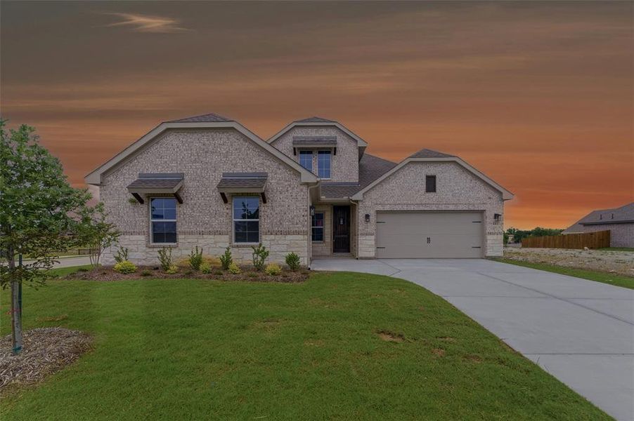 Front exterior of a new home in Cedar Ridge Estates, Anna, TX, highlighting curb appeal (Image 20).