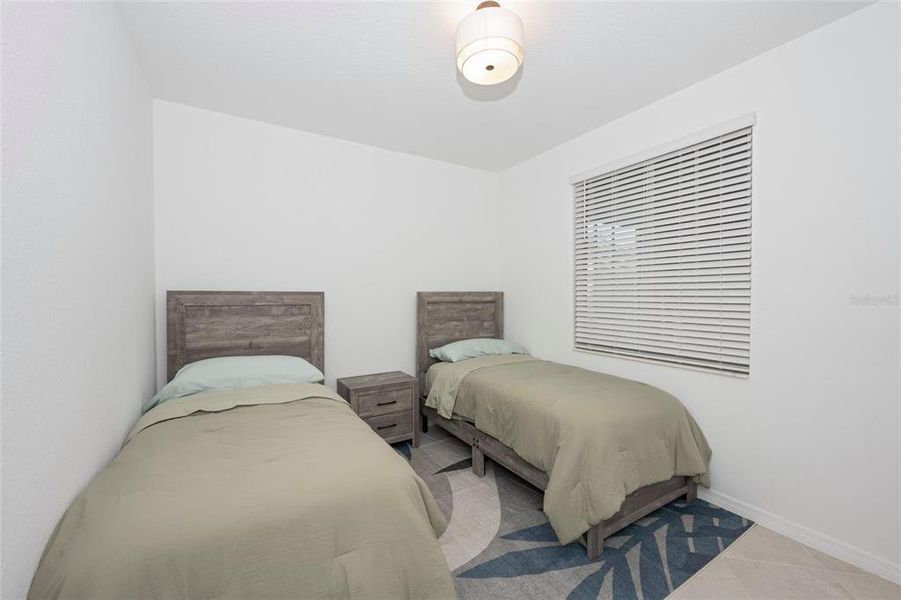 Furnished interior view inside a new home in Wellen Park Golf & Country Club, Venice (Image 41).