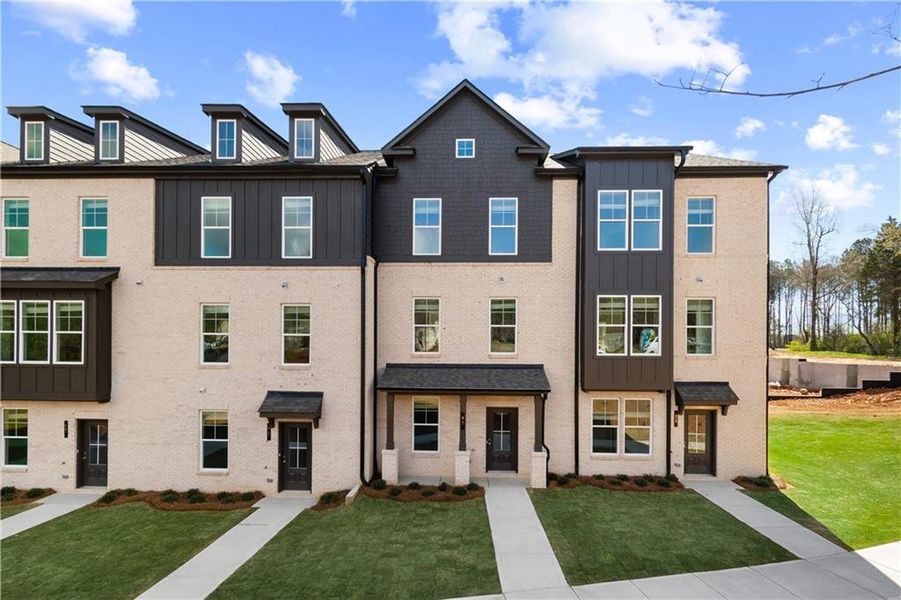 Front exterior of a new home in Daybreak, Newnan, GA, highlighting curb appeal (Image 17).