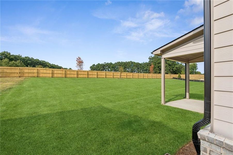 Front exterior of a new home in , Lawrenceville, GA, highlighting curb appeal (Image 2).