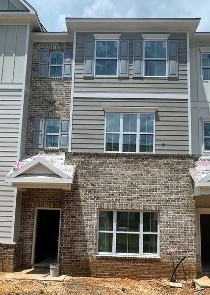 In-progress construction of a new home in Townes at South Main, Kennesaw, GA (Image 25).