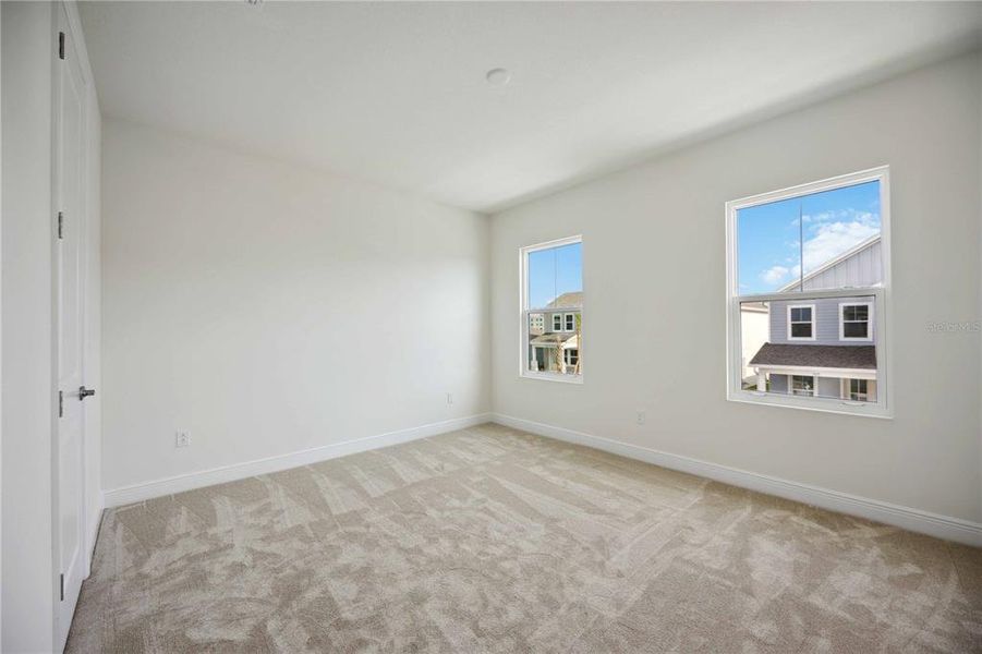 Spacious, unfurnished interior of a new home in Bungalow Walk at Lakewood Ranch, Lakewood Ranch (Image 21).