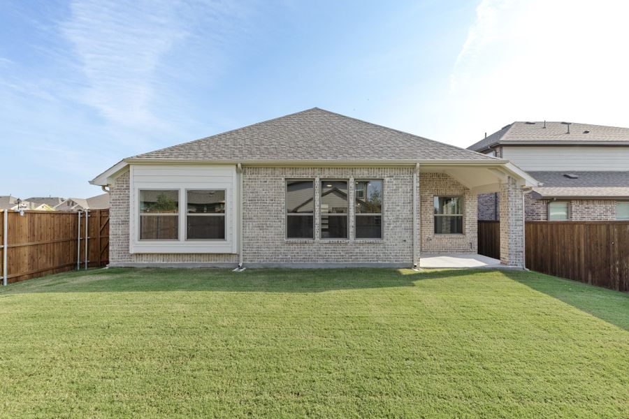 Exterior details and patio area of a home in Meadow Run, Melissa (Image 2). Exterior details and patio area of a home in Meadow Run, Melissa (Image 2).