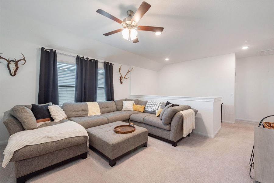 Game room at the top of the stairs for a second living area. Game room at the top of the stairs for a second living area.