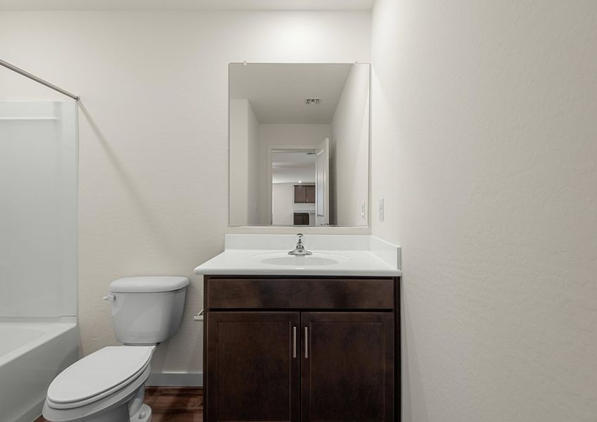 The secondary bathroom is the perfect space for guests to get ready in.