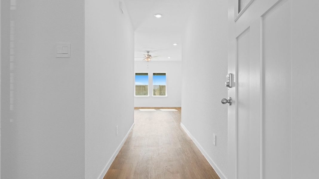 Spacious, unfurnished interior of a new home in Caldwell Crossing, Iowa Colony (Image 8).