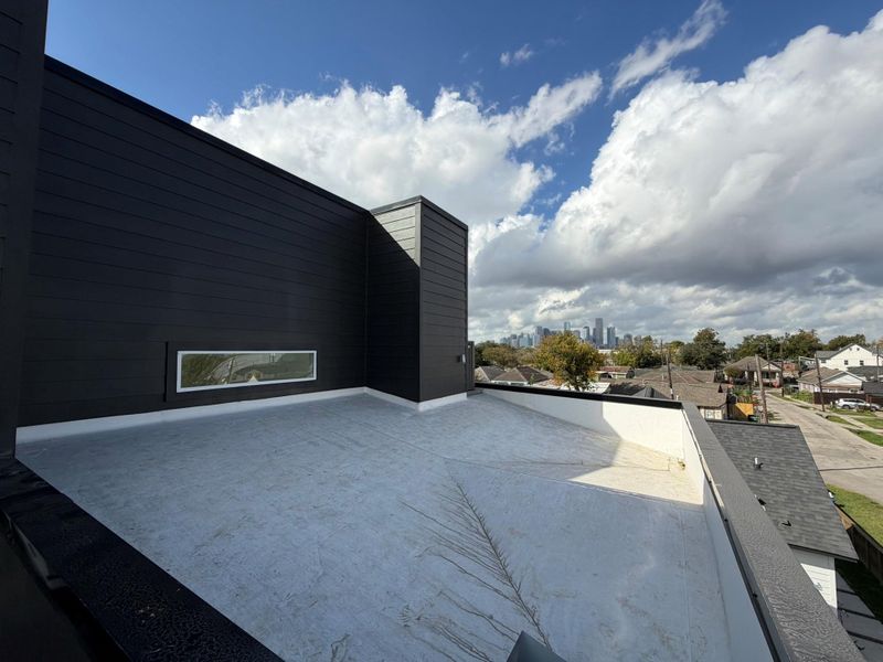 Exterior details and patio area of a home in , Houston (Image 2). Exterior details and patio area of a home in , Houston (Image 2).