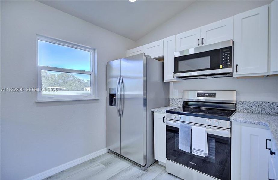 Furnished interior view inside a new home in , Avon Park (Image 7).