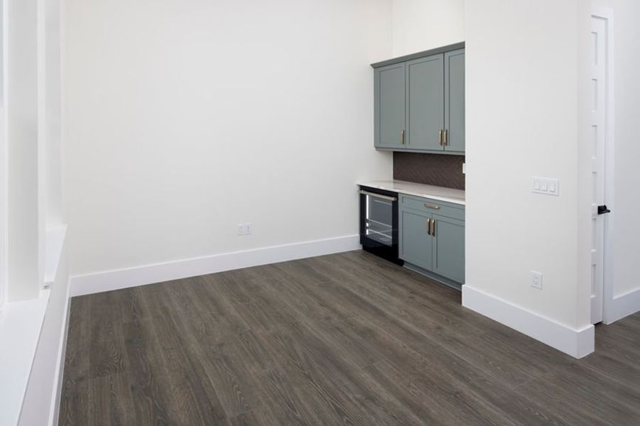 Representative unfurnished interior of a home built from the Grand Spinnaker by Minto Communities in Latitude Margaritaville Watersound, Panama City Beach (Image 11).
