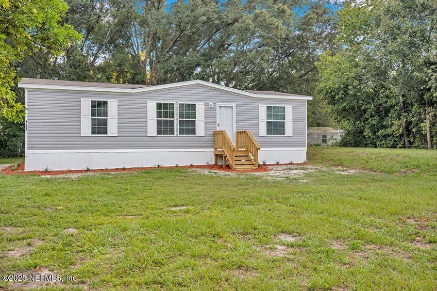 Exterior details and patio area of a home in , Jacksonville (Image 1). Exterior details and patio area of a home in , Jacksonville (Image 1).