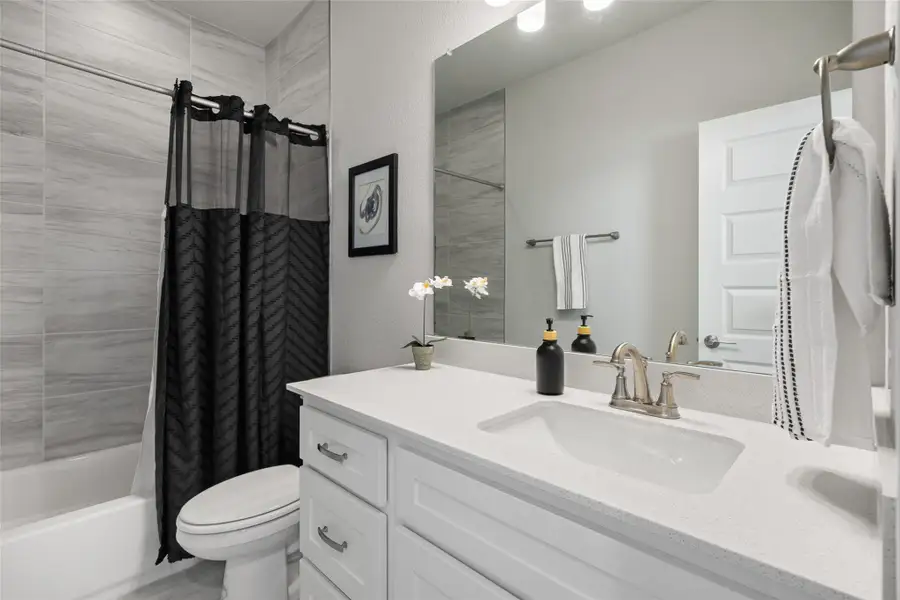 Bathroom with tub/shower combo conveniently located next to the two secondary bedrooms on the 2nd floor