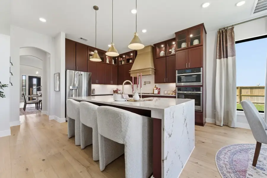 Representative furnished interior of a home built from the Laguna III by CastleRock Communities in Lakesong, Grand Prairie (Image 17).