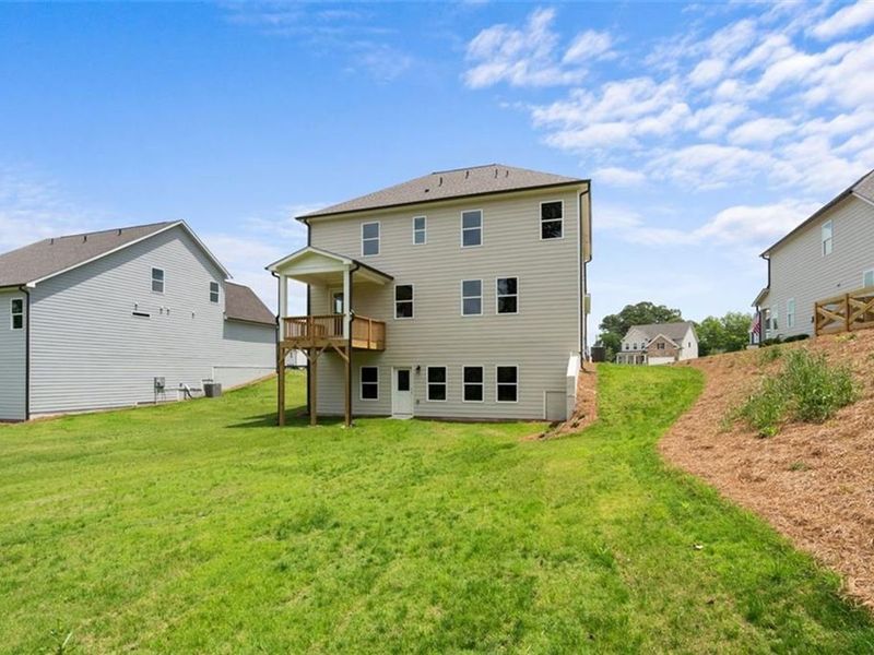 Exterior details and patio area of a home in Wehunt Meadows, Hoschton (Image 20).