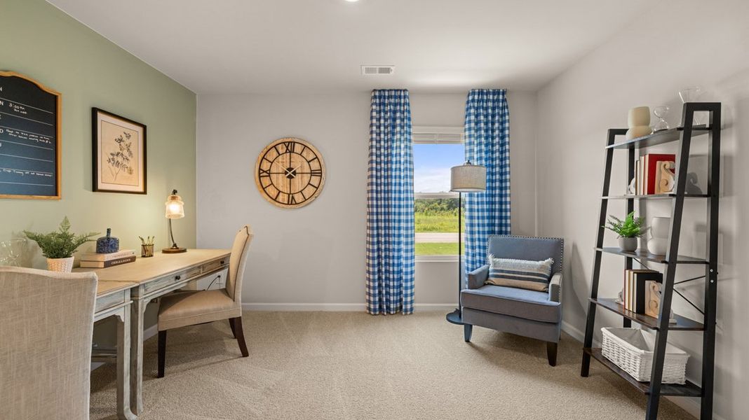 Representative furnished interior of a home built from the Elston - Express by D.R. Horton in The Abbey at Trolley Run Station, Aiken (Image 24).