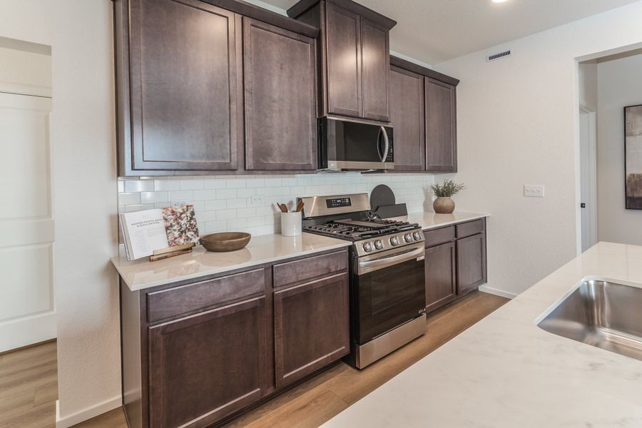 Representative furnished interior of a home built from the Armstrong by Hartford Homes in Bloom, Fort Collins (Image 19).