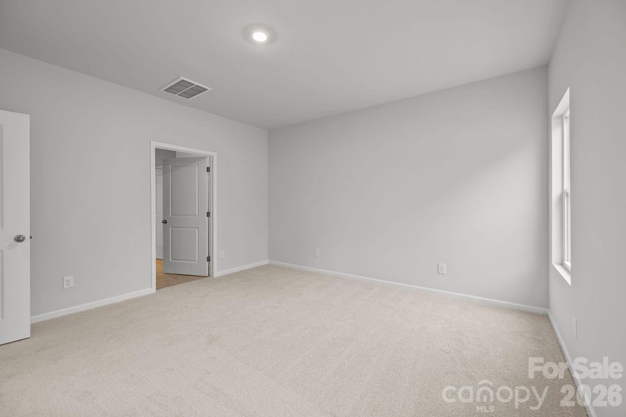 Spacious, unfurnished interior of a new home in Cottages at Wingate, Wingate (Image 24).