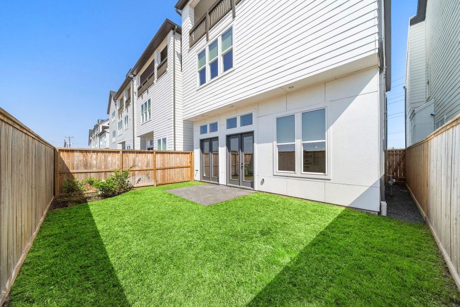 same size yard (18ft deep) as this except has 10ft glass sliding doors instead of french doors