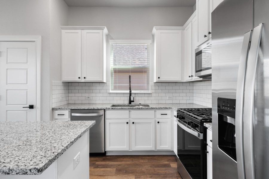 Furnished interior view inside a new home in TRACE, San Marcos (Image 4).