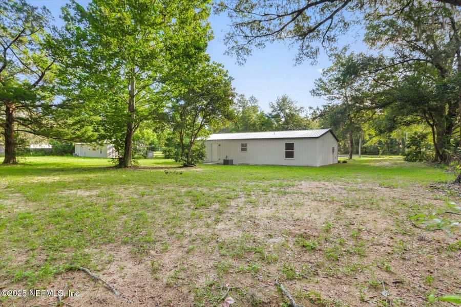 Front exterior of a new home in , Interlachen, FL, highlighting curb appeal (Image 22).