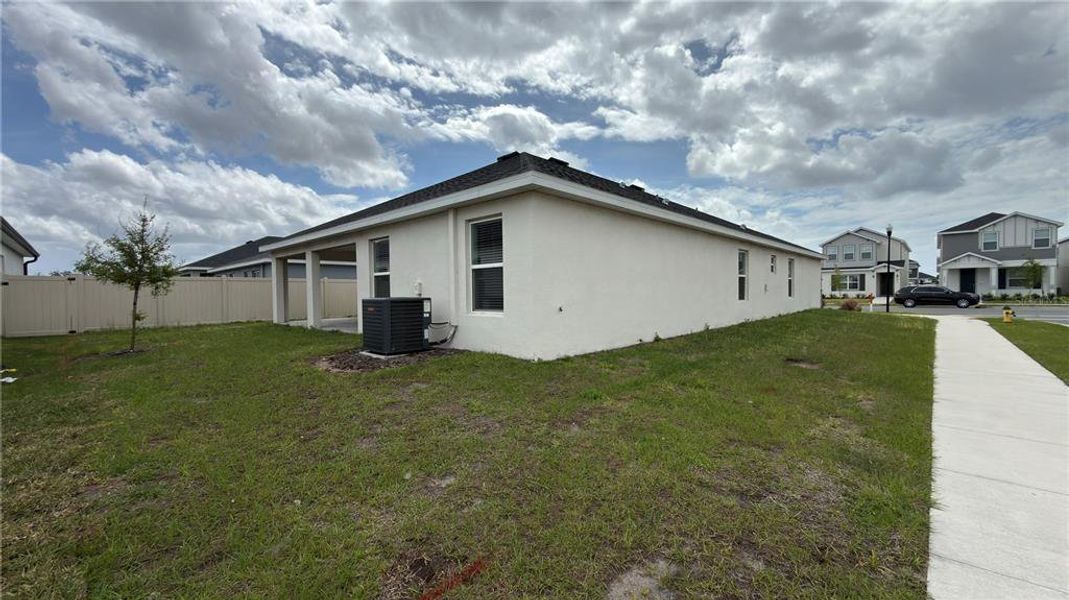 Exterior details and patio area of a home in , St. Cloud (Image 4).