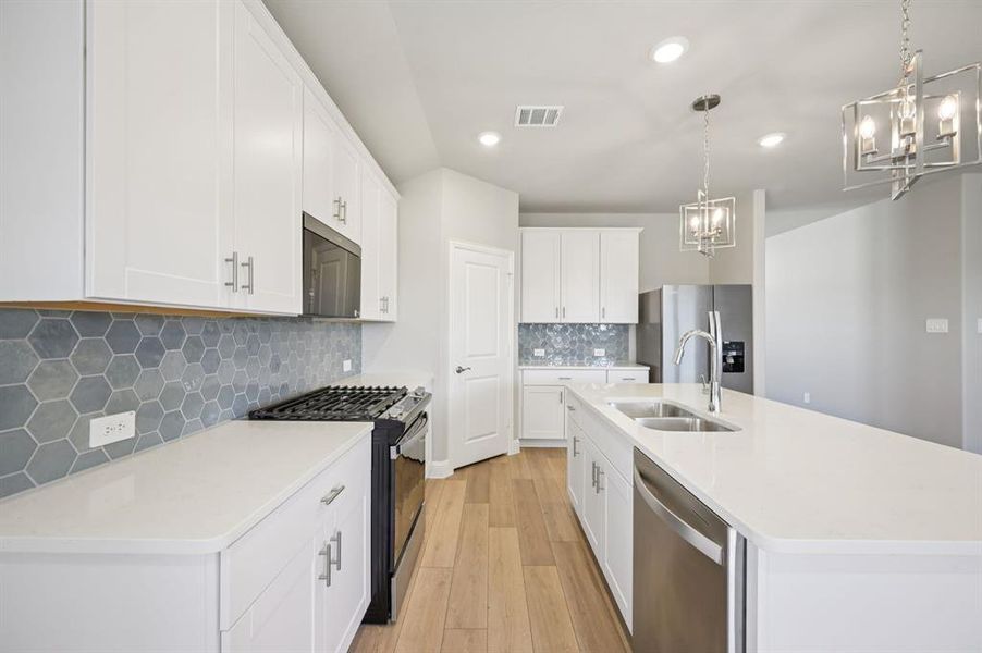 Photo is not of the actual home, but is an inspirational photo of builder’s model home and may depict options, furnishings, and/or decorator features that are not included.