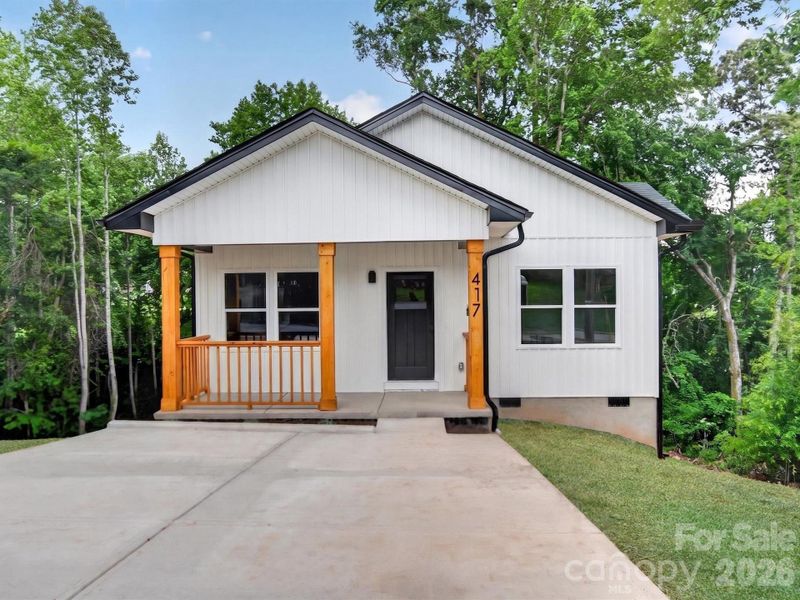 Front exterior of a new home in , Hickory, NC, highlighting curb appeal (Image 25).