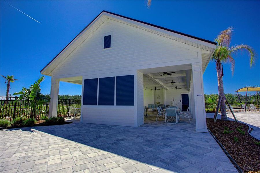 Exterior details and patio area of a home in Sawmill Branch Express, Palm Coast (Image 4).