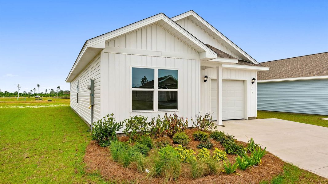 Front exterior of a new home in Liberty, Panama City, FL, highlighting curb appeal (Image 2). Front exterior of a new home in Liberty, Panama City, FL, highlighting curb appeal (Image 2).