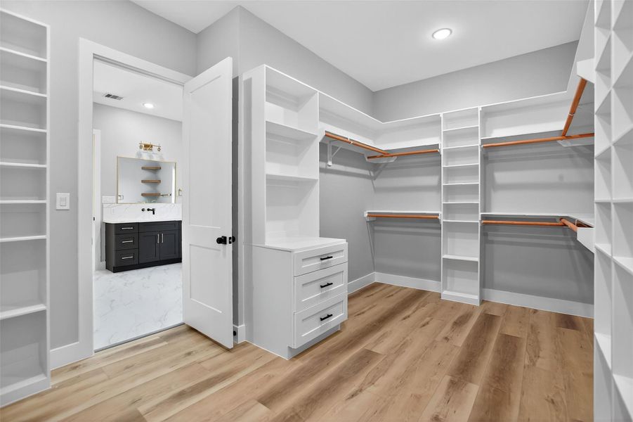 The owner’s retreat en-suite bathroom with access to the large walk-in closet