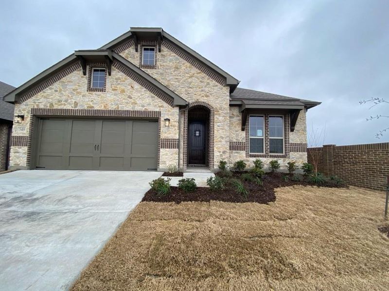 Front exterior of a new home in Morningstar, Aledo, TX, highlighting curb appeal (Image 2). Front exterior of a new home in Morningstar, Aledo, TX, highlighting curb appeal (Image 2).