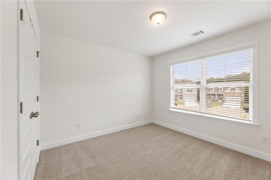 Spacious, unfurnished interior of a new home in Clark Farms, Flowery Branch (Image 20).