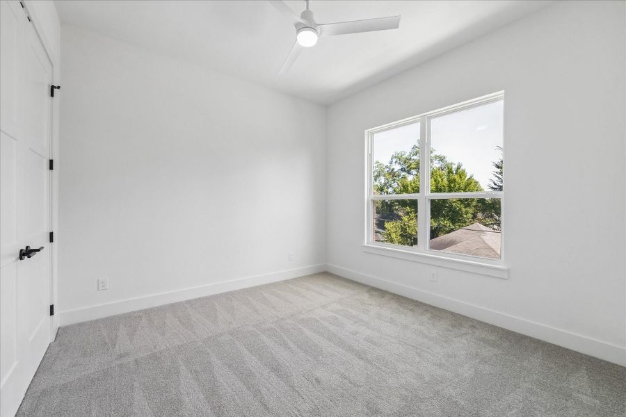 Bright proportions and clean architectural details create another inviting retreat.
